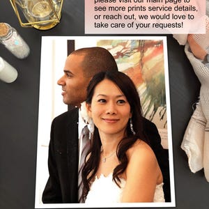 May include: A rectangular photograph featuring a couple in formal attire, with a person in a black suit and a person in a white dress. The image includes text: Need large size? For more large sizes selection, please visit our main page.