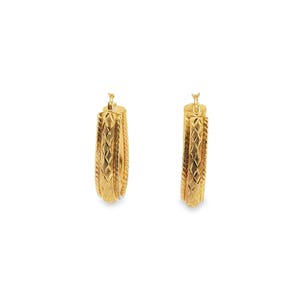 May include: Two gold-colored hoop earrings. Each earring has a textured, geometric pattern. The earrings are displayed against a white background. The earrings are approximately 1 inch in length.