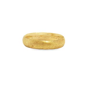 May include: A gold-colored ring with a textured surface. The ring has engraved text. The ring is set against a white background. The ring is a piece of jewelry.