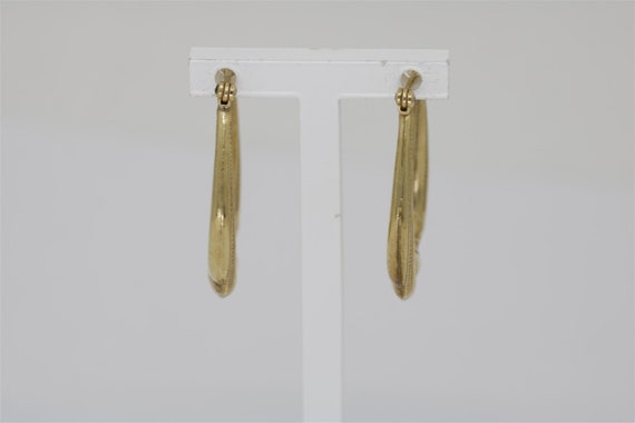 Vintage 14k Yellow Gold Oval Hoop Earrings 1.125" - image 1