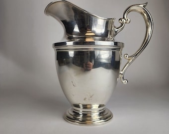 Sterling Silver Pitcher with Ornate Handle