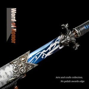 May include: A blue and silver sword with a dragon head handle. The sword has a decorative design on the blade and a black leather wrap on the handle. The text "Word of Honor" is visible in the image.