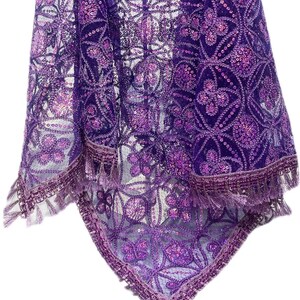 May include: A purple sequined lace fabric with a fringe border. The fabric has a floral pattern and is sheer.