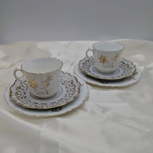 Vintage mix and match 22K gold on white porcelain tea coffee desert cake pie set.Two cups, two saucers, two serving plates.Vintage condition
