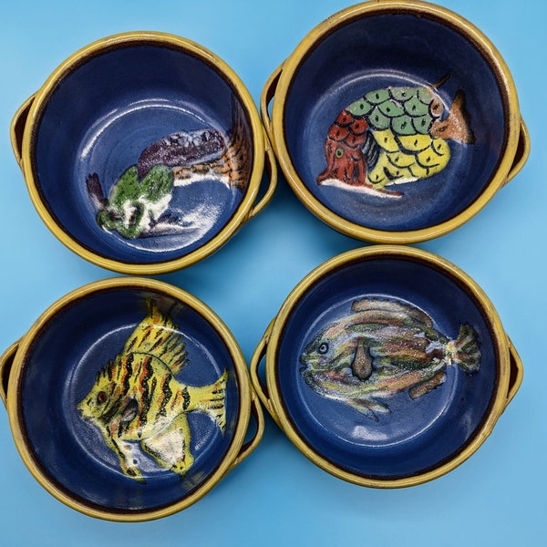 Four handmade stoneware bowls with artwork finished in a colored glossy glaze. Made in Colombia, perfect condition, collectable stoneware.