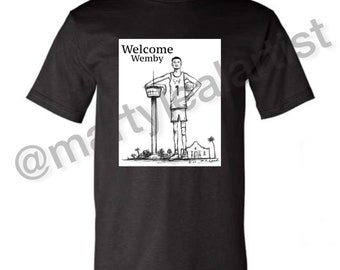 Welcome Wemby tshirt with black background/ tshirt.  Inspired by the projected number one NBA pick in the 2023 draft by the S.A. Spurs.