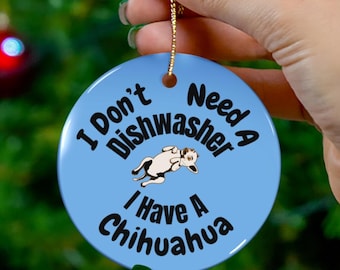 May include: A light blue ceramic Christmas ornament with the text "I Don't Need A Dishwasher I Have A Chihuahua". The ornament features a cartoon illustration of a Chihuahua. A gold string is attached for hanging.