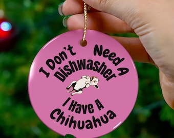 May include: A pink ceramic Christmas ornament with the text "I Don't Need A Dishwasher I Have A Chihuahua". The ornament features a cartoon chihuahua illustration.