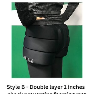 May include: Black padded leggings with a double layer of shock-absorbing foam padding in the rear. The padding is 1 inch thick and the leggings have the word "RIPPLE" printed on the left thigh.