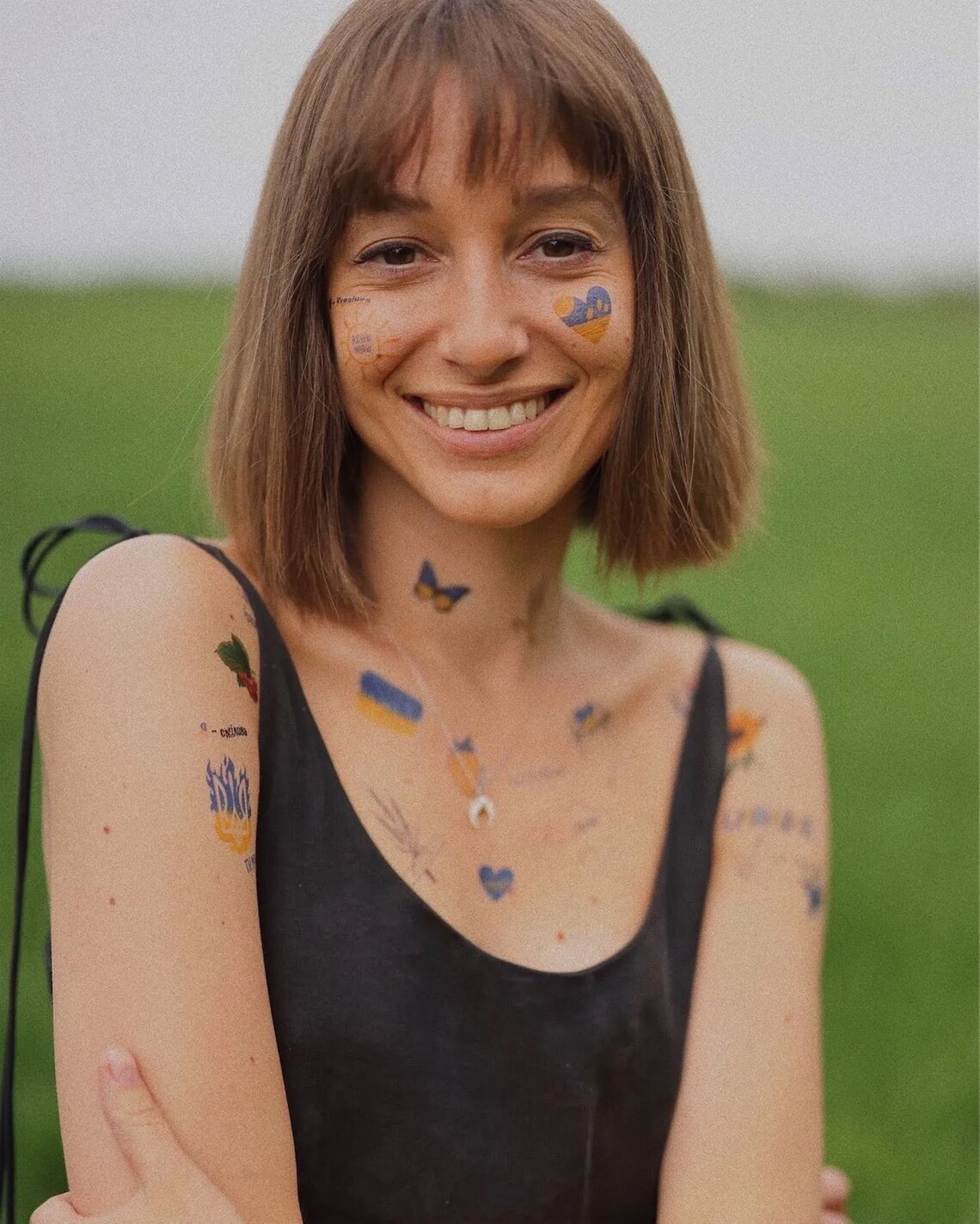 Colorful Sun Temporary Tattoos With Ukrainian Flag and Ornaments