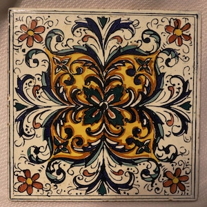 Colorful ceramic tile, made in Spain, can be used as wall decor or trivet, geometric design
