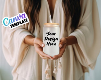 May include: A white frosted tumbler with a bamboo lid and a clear straw. The tumbler has a black text overlay that says "Your Design Here".