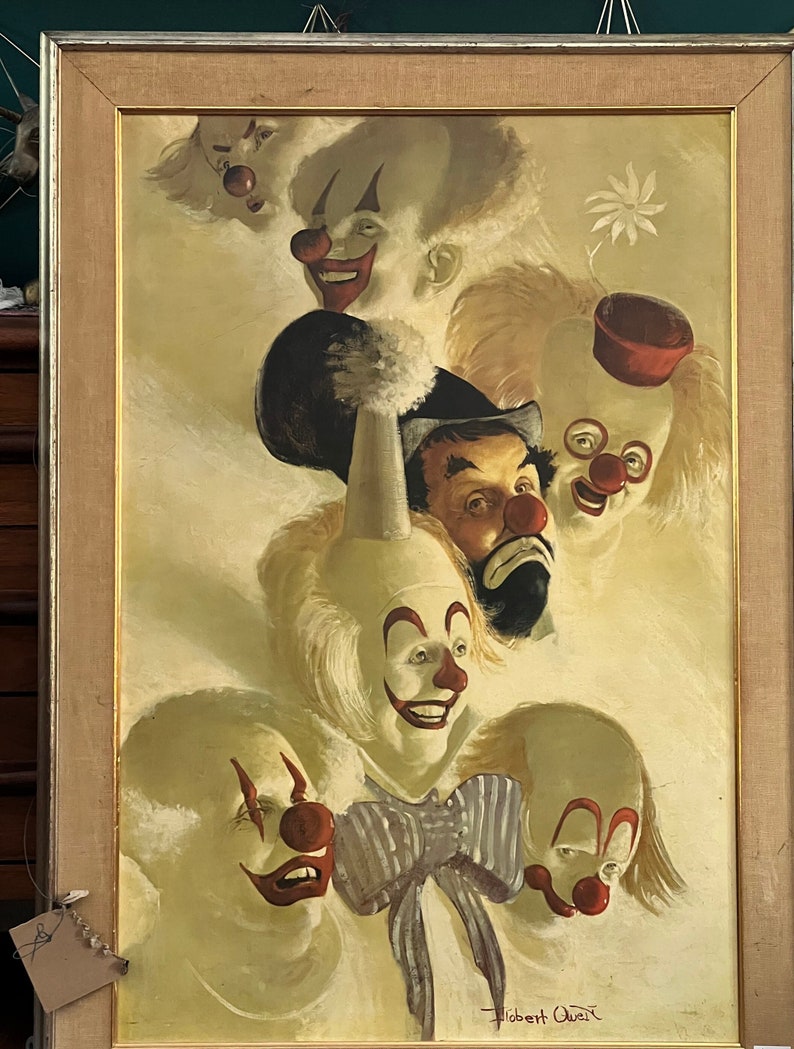 May include: A framed painting of five clowns with white faces, red noses, and colorful costumes. The painting is signed "Robert Owen" in the bottom right corner.