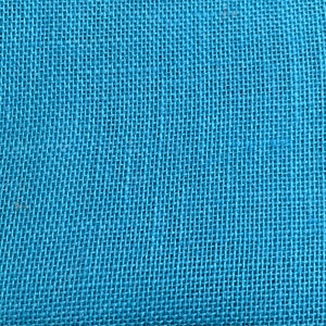 May include: A close-up of a blue woven fabric with a textured surface.