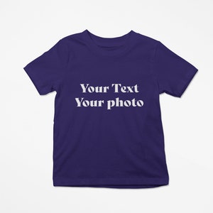 a purple t - shirt that says your text is your photo