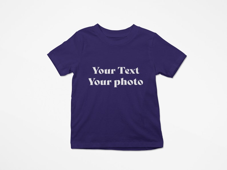 a purple t - shirt that says your text is your photo