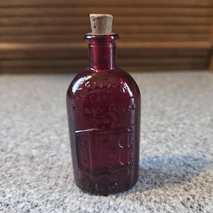 Botella miniatura de color rojo rubí de Wheaton, NJ, emblema de Frank's Cure, coleccionable de la década de 1970