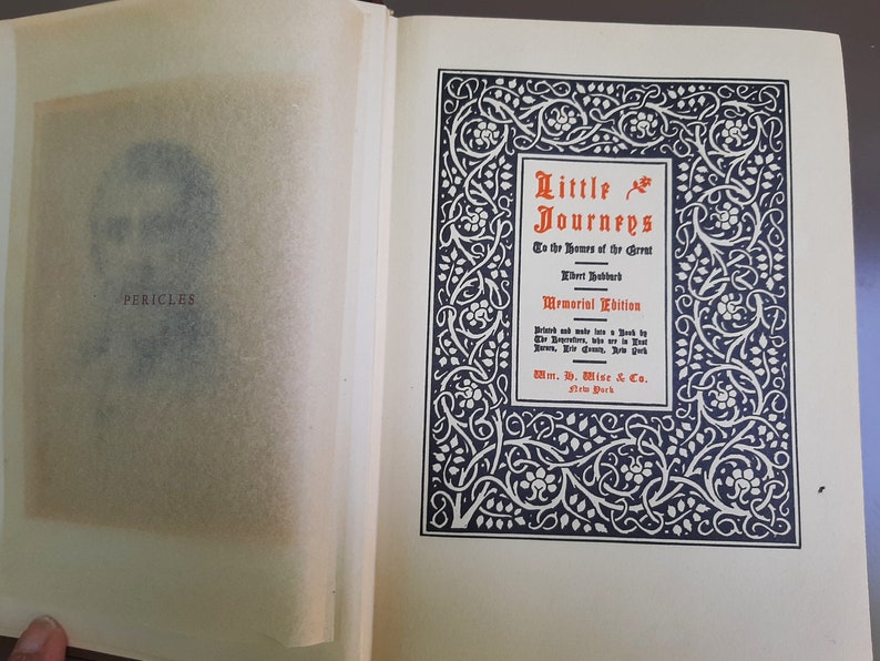 May include: A vintage book titled "Little Journeys to the Homes of Great Men" by Elbert Hubbard. The book is a Memorial Edition, printed and made in a book by The Roycrofters, who are in East Aurora, New York. The book is published by Wm. H. Wise & Co., New York.
