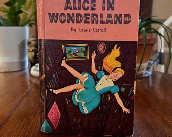Alicia en el País de las Maravillas y A través del espejo, de Lewis Carroll, © 1955. Tapa dura. Whitman Classics.