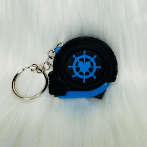 Regalo de polvo de hadas, llavero con cinta métrica para timón de barco, extensor de peces de crucero de Disney para papá, herramienta para el día del padre, FE para adolescentes, regalo para calcetines