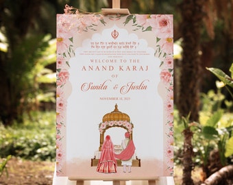 May include: A wedding announcement sign with pink floral borders. The sign reads "Welcome to the Anand Karaj of Sunila & Justin, November 18, 2023". The sign also features a traditional Sikh wedding ceremony illustration.