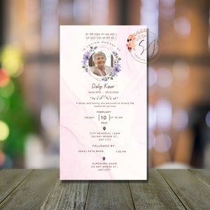 May include: A pink and white marble-textured memorial card with a photo of a woman in a floral wreath. The card includes the text "In Loving Memory of Dalip Kaur 14.02.1970 - 09.12.2022" and details for a memorial service on February 10, 2023 at 10 AM at City Memorial Lawn, 123 Any Where St., Any City, followed by a Sehaj Path Bhog at 1:00 PM at Gurdwara Sahib, 123 Any Where St., Any City.
