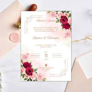 May include: A pink and white floral wedding invitation with gold accents. The invitation is for a Mehndi & Sangeet celebration for Ranbir & Harnoor, hosted by the Bajwa family. The event will take place on Wednesday, 11 May 2023 at 5:00 PM at Paradise Banquets, 123 Street, City.