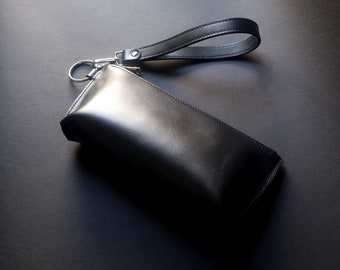 Black leather wristlet with lining - Leather clutch with a removable wrist strap - Minimalist wrist bag - Handmade leather handbag