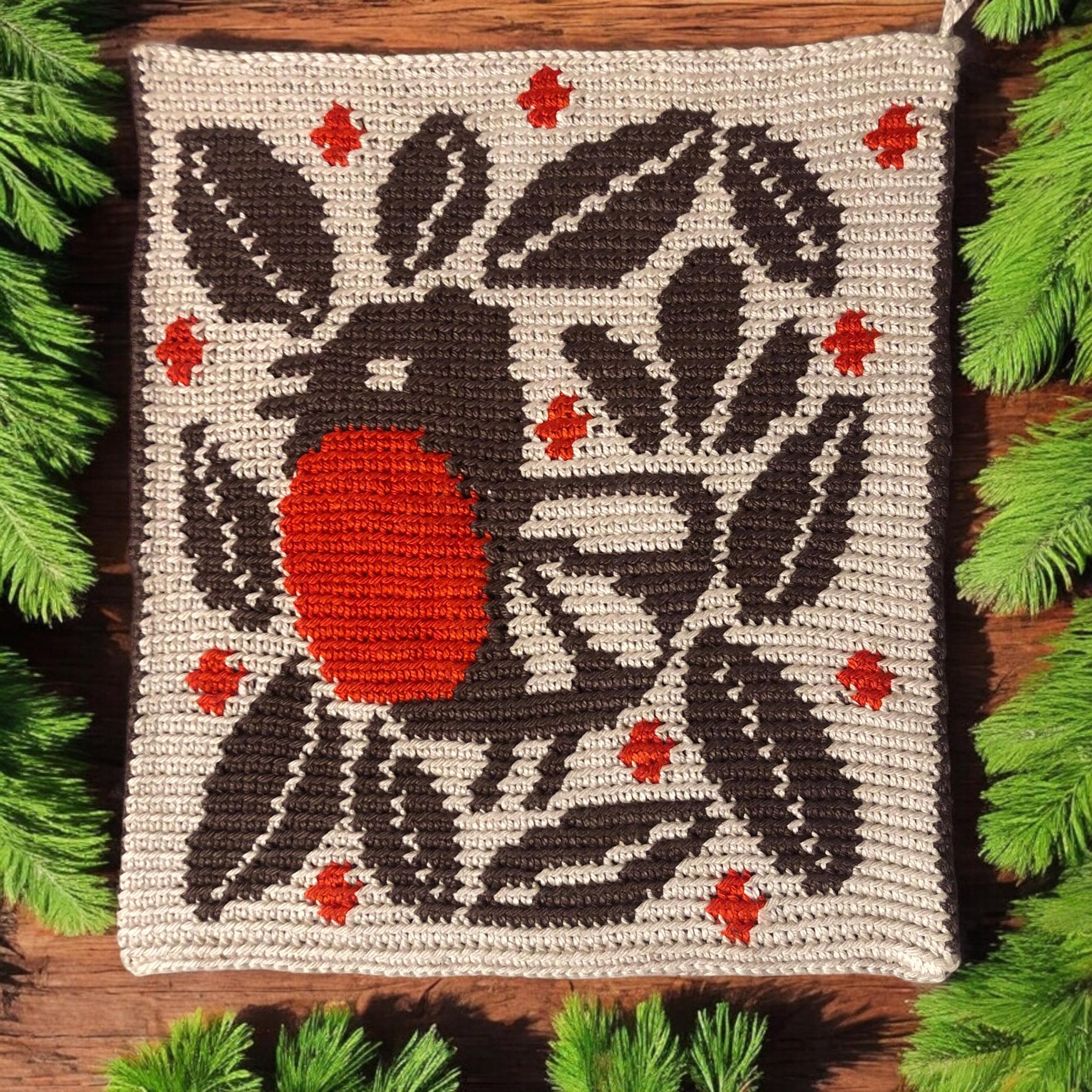 15 Tapestry Crochet Patterns: Our Favorite Wall Art, Bags, and Gifts 8 Winter Bird Tapestry Crochet Potholder