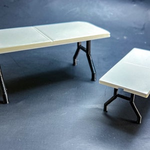 1:12 scale version of a 6&#39; White Table with Foldable Legs.