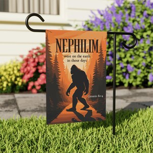 May include: A garden flag featuring a silhouette of a Bigfoot walking on a path through a forest. The flag has an orange and brown color scheme with the text "NEPHILIM were on the earth in those days" and "Genesis 6:1-4".