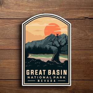 May include: A vintage-style illustration of Great Basin National Park in Nevada. The image features a mountain range, a lake, a tree, and a setting sun. The text "Great Basin National Park" and "Nevada" is displayed below the illustration.