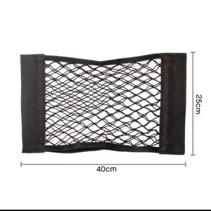 May include: Black mesh car storage net, 40cm wide and 25cm high, with black fabric borders. The net is designed to hold items securely. Ideal for organizing car interiors.