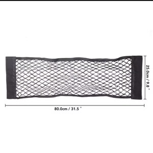 May include: A black mesh cargo net, 31.5 inches long and 9.8 inches high, with black fabric edges. The net is designed for vehicle storage and organization. The dimensions are clearly marked on the image.