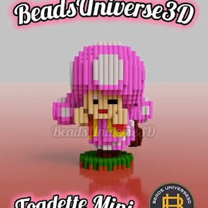 May include: A pink and white 3D beaded figure of a character from the Super Mario franchise. The figure is standing on a green base and is labelled "Toadette Mini". The image also includes the text "Beads Universe 3D".