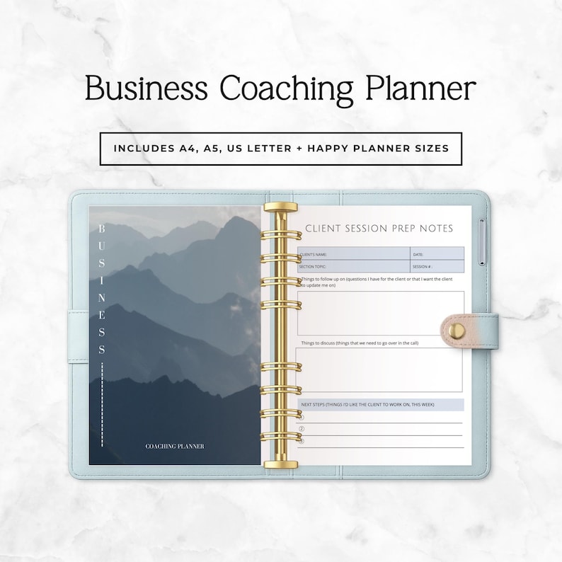 May include: A light blue Business Coaching Planner with gold-colored rings. The planner includes A4, A5, US Letter, and Happy Planner sizes. The planner has a mountain landscape design and includes Client Session Prep Notes.