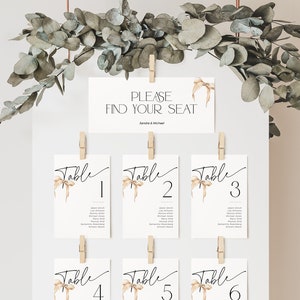 Modello di tabella dei posti a sedere per cartellini da tavolo Neutro "Si sta sposando", fiocco beige Acquerello Trova il tuo posto Banner, cartello per matrimonio moderno e minimalista BS60