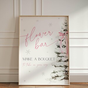 May include: A printable sign with a watercolor illustration of a wintery pine tree with a pink ribbon. The sign says "Flower Bar" and "Make a Bouquet to take on your way".