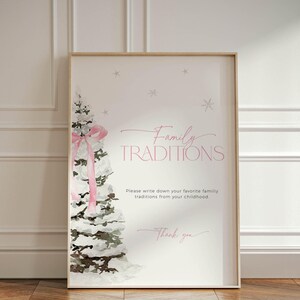 May include: A printable sign with a watercolor illustration of a snowy pine tree with a pink ribbon. The sign says "Family Traditions" and asks guests to write down their favorite family traditions from their childhood.