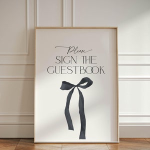 Zwarte strik gastenboek bord vrijgezellenfeest kaart, Shes Tying the Knot onze gastenboek bewegwijzering sjabloon, moderne gotische vrijgezellenfeest tafelposter, BS99