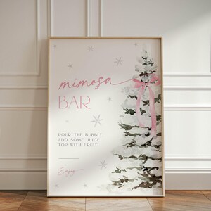 May include: A printable sign for a mimosa bar with a watercolor illustration of a snowy pine tree with a pink ribbon. The text reads "mimosa bar" and "Pour the bubbly, add some juice, top with fruit. Enjoy!"