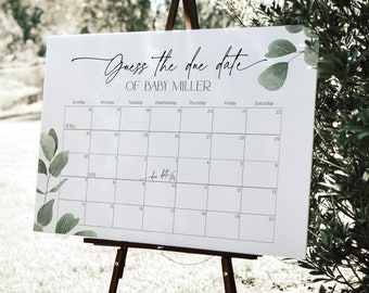 Puede incluir: Un cartel blanco con un calendario en él. El cartel dice "Adivina la fecha de parto de Baby Miller". El calendario tiene una fecha de parto marcada.