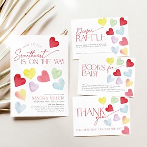 May include: A baby shower invitation with a watercolor design of hearts in various colors. The text reads "Our Little Sweetheart Is On The Way" and includes the date, time, and location of the event. The invitation also includes information about a diaper raffle and a request for guests to bring a book for the baby.