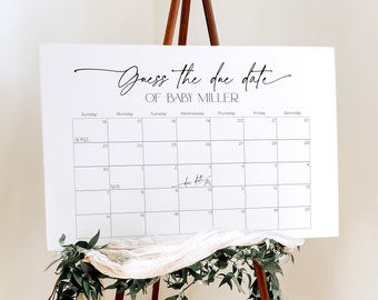 Könnte beinhalten: Ein weißer Kalender mit schwarzem Rand und schwarzem Text. Der Kalender trägt den Titel "Erraten Sie das Geburtsdatum von Baby Miller". Der Kalender ist für April und Mai. Das Geburtsdatum ist im Kalender markiert.