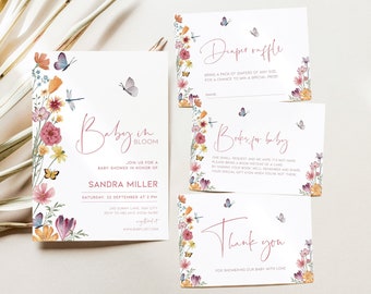 May include: A set of four baby shower cards with a floral design and butterflies. The cards are for a diaper raffle, books for baby, and a thank you card. The main card is a baby shower invitation with the text "Baby in Bloom" and the date and time of the shower.