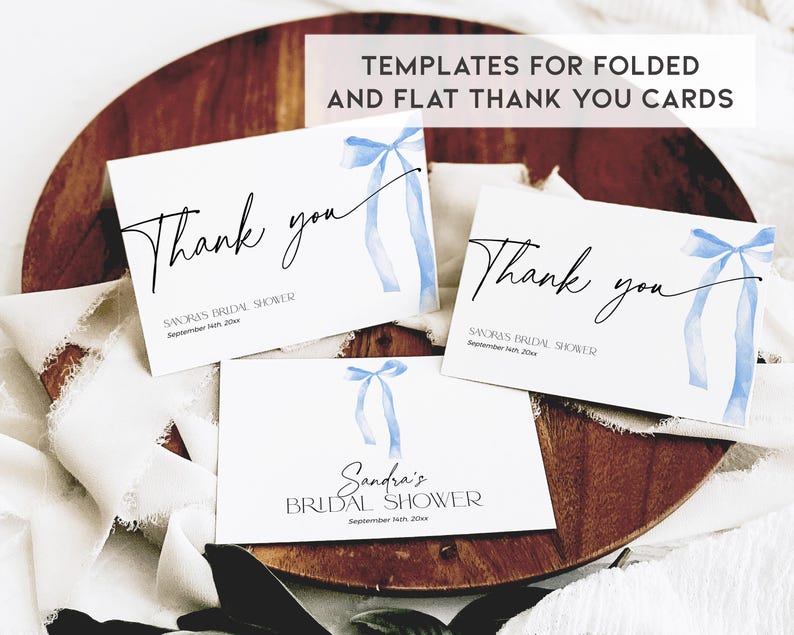 May include: Three printable thank you cards with a blue watercolor bow design. The cards say "Thank you" and include the text "Sandra's Bridal Shower" and "Savora's Bridal Shower".