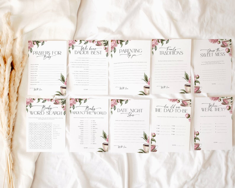 Puede incluir: Un conjunto de juegos imprimibles para baby shower con ilustraciones florales. Los juegos incluyen "Oraciones para el beb&eacute;", "&iquest;Qui&eacute;n conoce mejor a pap&aacute;?", "Consejos de crianza para ti", "Tradiciones familiares", "Adivina el dulce desastre", "B&uacute;squeda de palabras para beb&eacute;s", "Beb&eacute; alrededor del mundo", "Ideas para una noche de citas", "&iquest;Qu&eacute; edad ten&iacute;a el futuro pap&aacute;?", y "&iquest;D&oacute;nde estaban?"