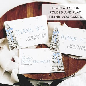 May include: Printable thank you cards featuring a wintery blue and white pine tree design. The text reads "Thank You for showering our baby with love".