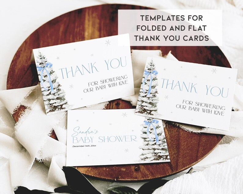 May include: Printable thank you cards featuring a wintery blue and white pine tree design. The text reads "Thank You for showering our baby with love".