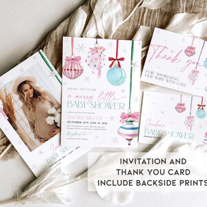 May include: A set of two printable cards for a baby shower. The invitation card features a watercolour illustration of pink and blue baubles with snowflakes and the text "A Merry Little Baby Shower". The thank you card features a similar illustration with the text "Thank you for showering our baby with love".